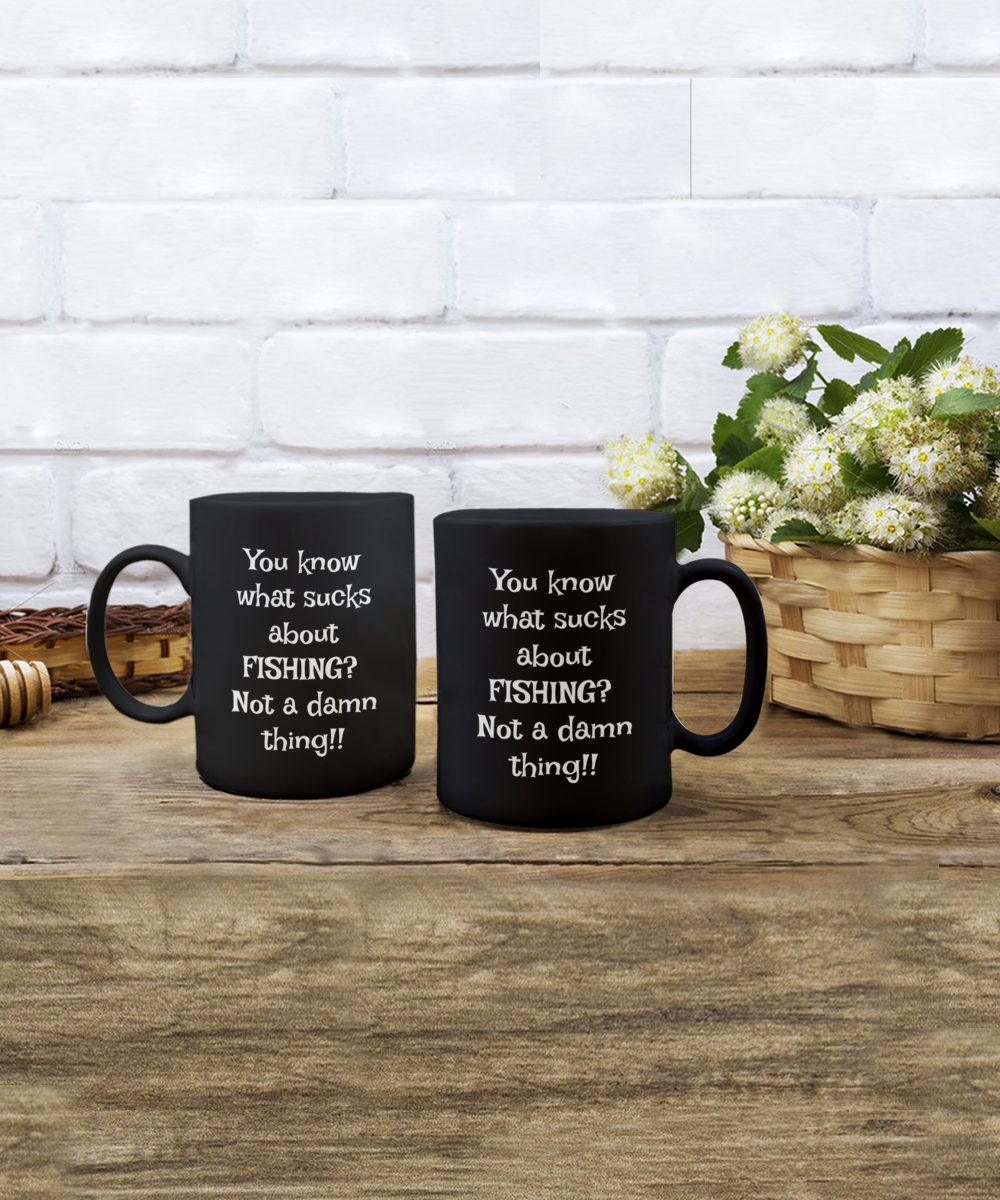 You know what sucks about FISHING? Not a damn thing!! 11oz mug, black, funny